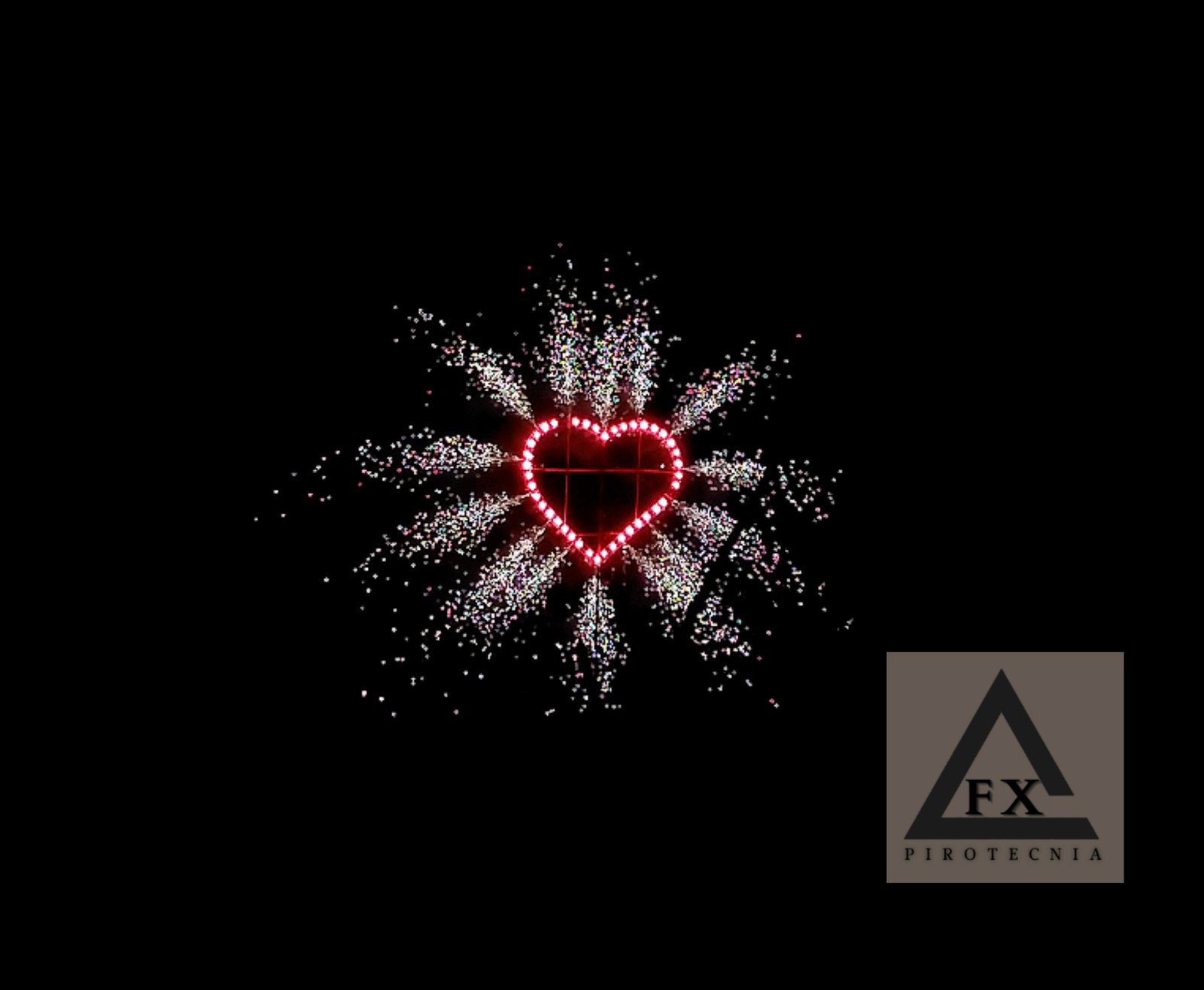 Corazón iluminado con efecto de chisperos